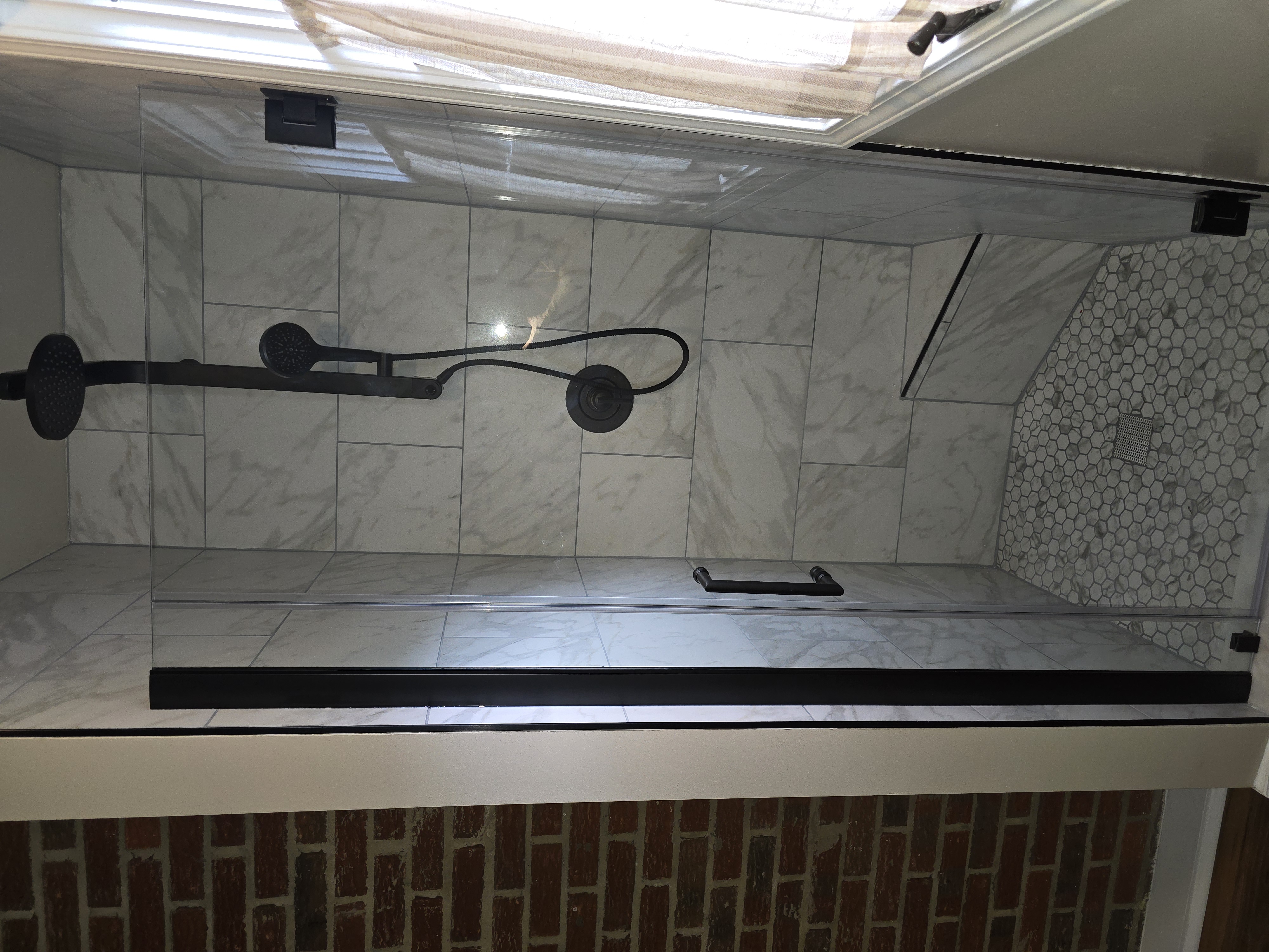 Bathroom 1 custom tiled shower after renovation